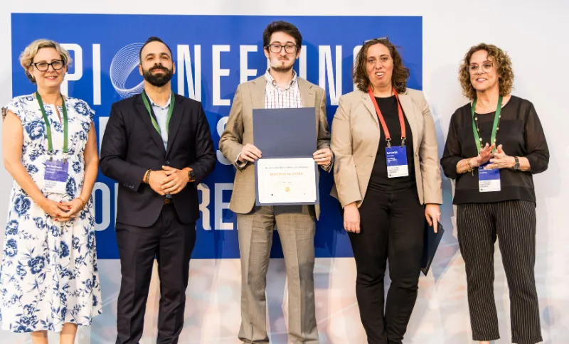 WiMNet lab PhD student Alon Levin receiving the Best Engineering Poster Award